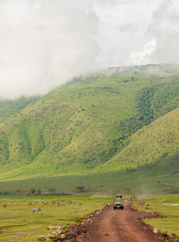 Safari jeep in Ngorongoro Crater landscapes