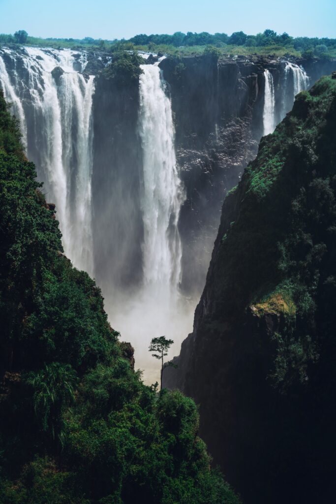 Victoria Falls waterfall with lush rainforest greenery