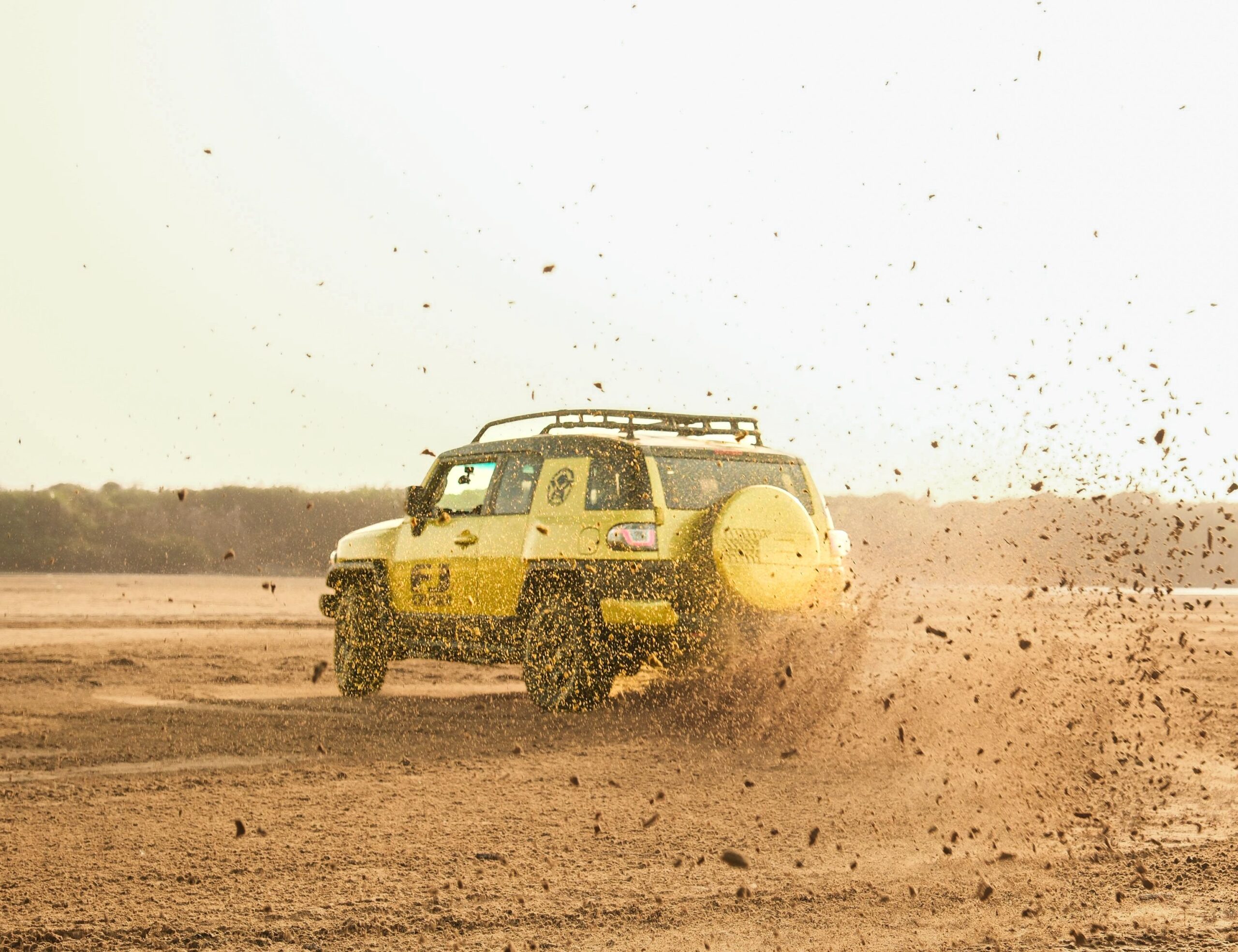 Uganda Safari Vehicle Hire 7 Off-road SUV on dusty track